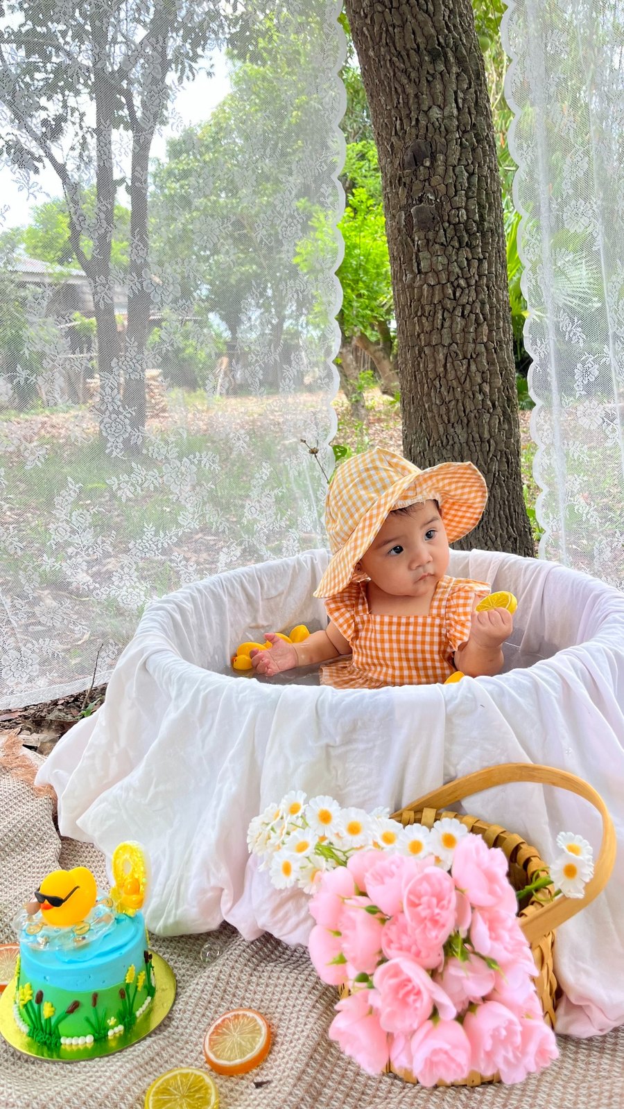 Ciara wearing an orange gingham outfit outdoors